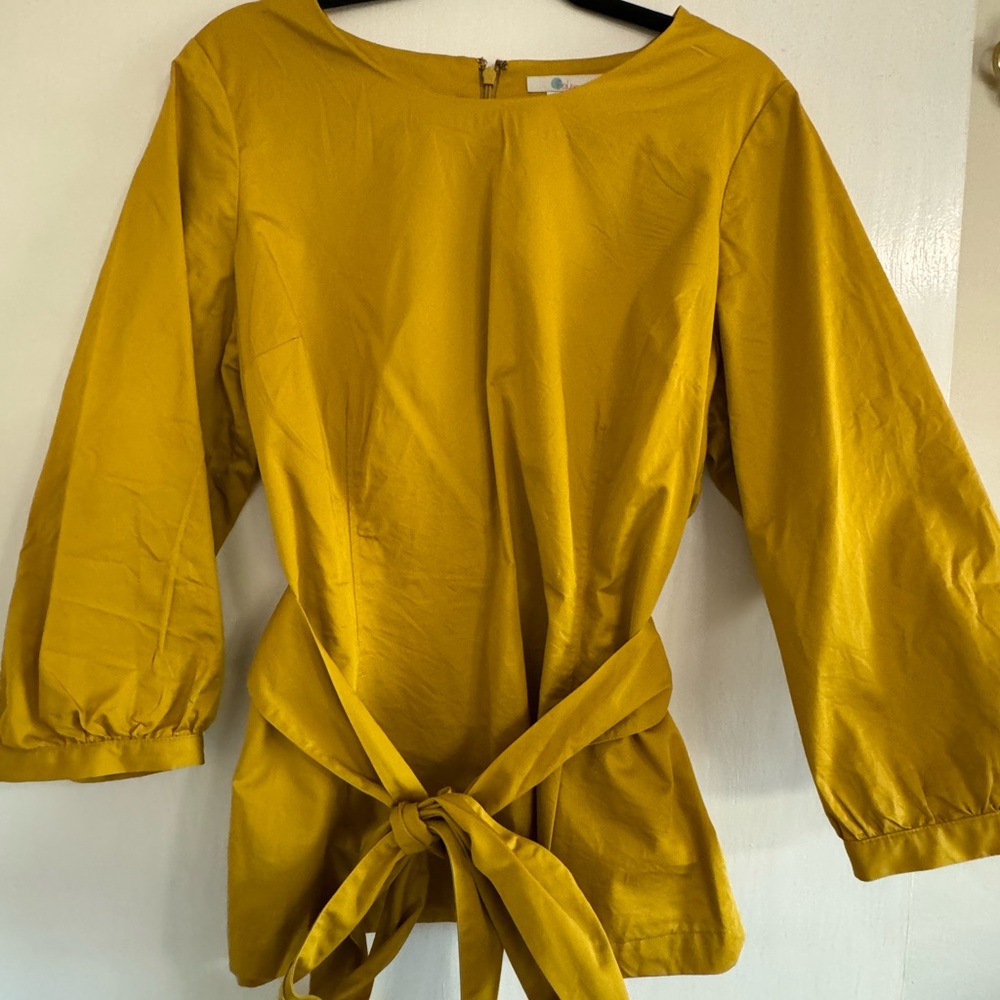 Mustard colored women’s top